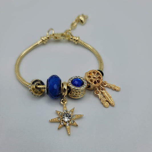 SS Pulsera Inspirada en Pandora Dorada - Atrapasueños y Estrella